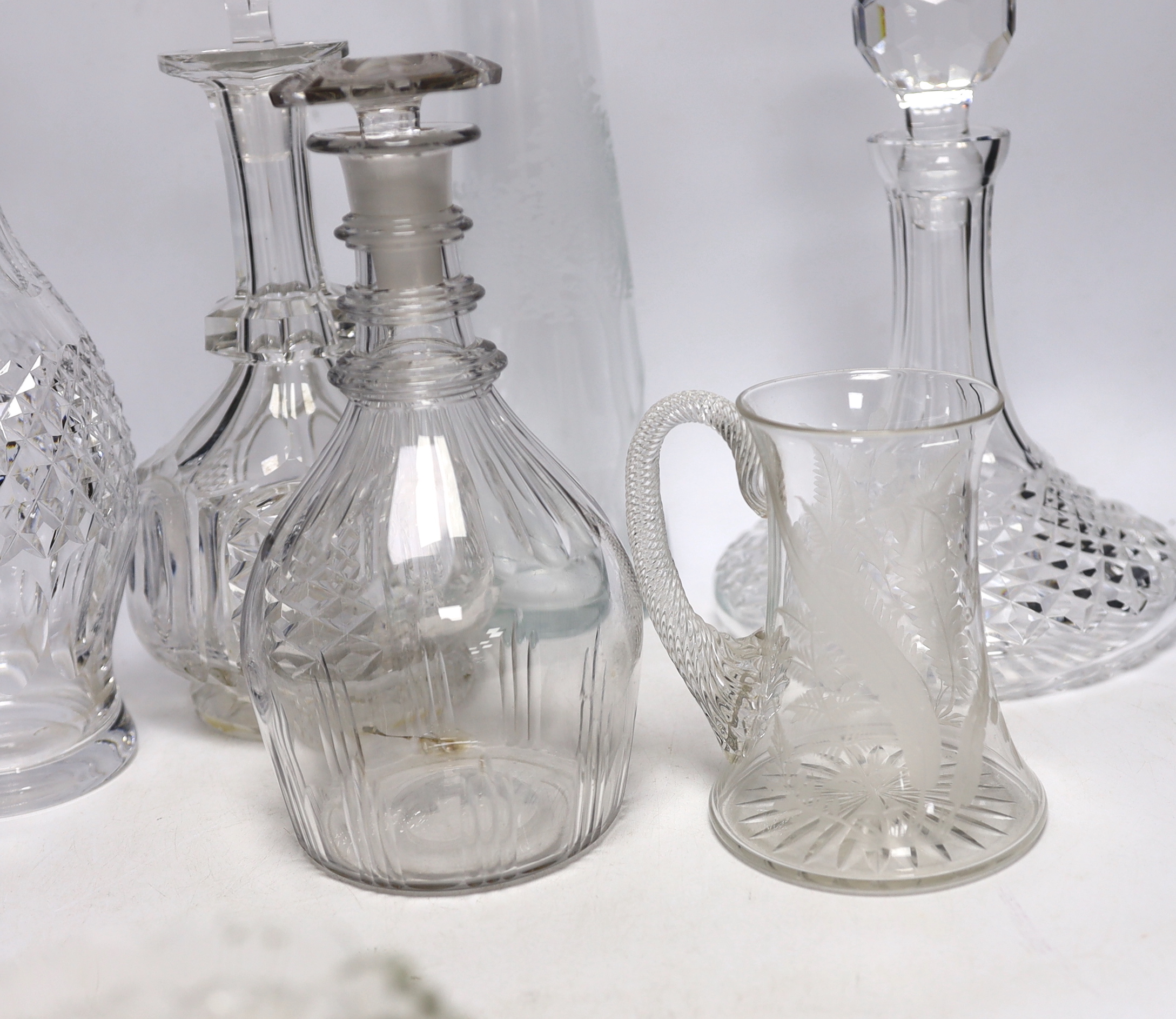 Antique and later glassware including four decanters, dishes and etched vase, largest 33cm high